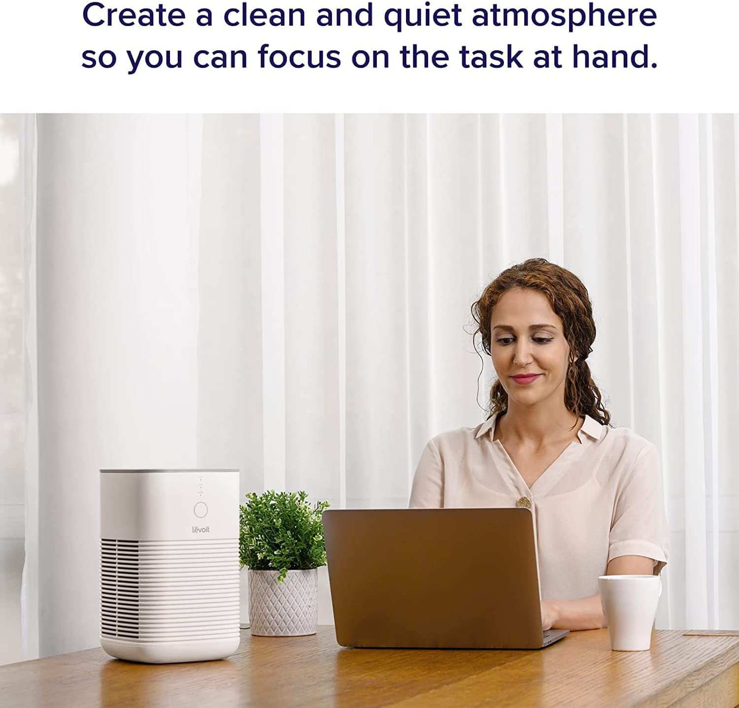 Levoit Desktop True HEPA Air Purifier creating a clean and quiet atmosphere, perfect for focused work or study environments