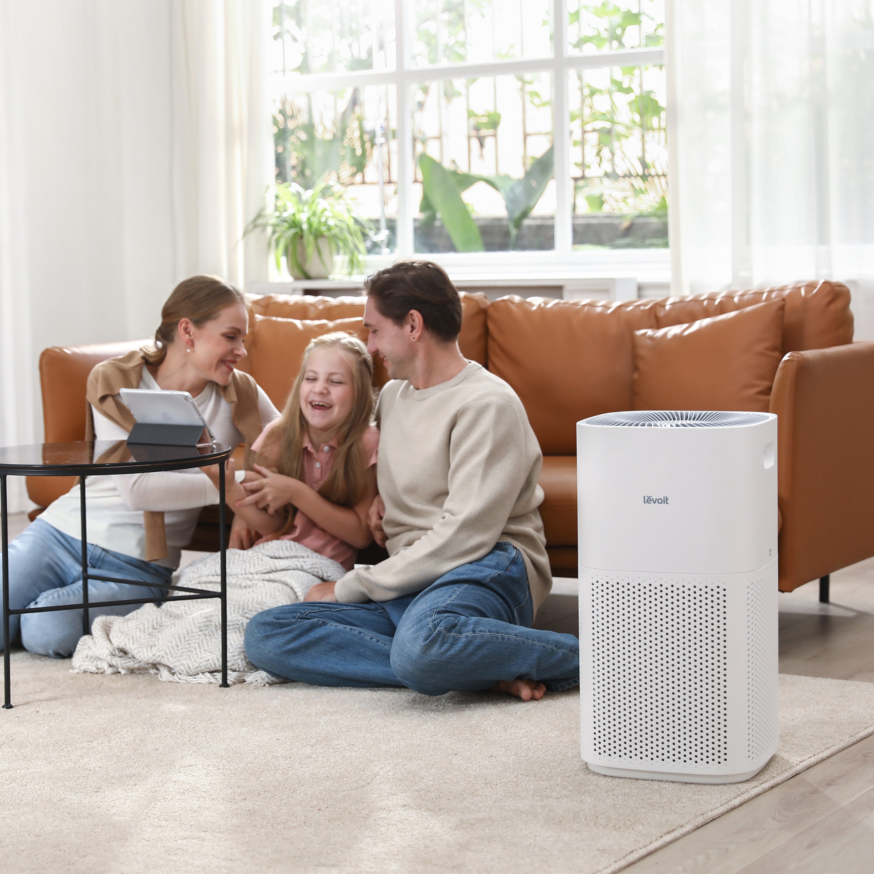 Levoit Core 600S Smart Air Purifier in a living room, ensuring clean air for family time with its powerful filtration and smart features.