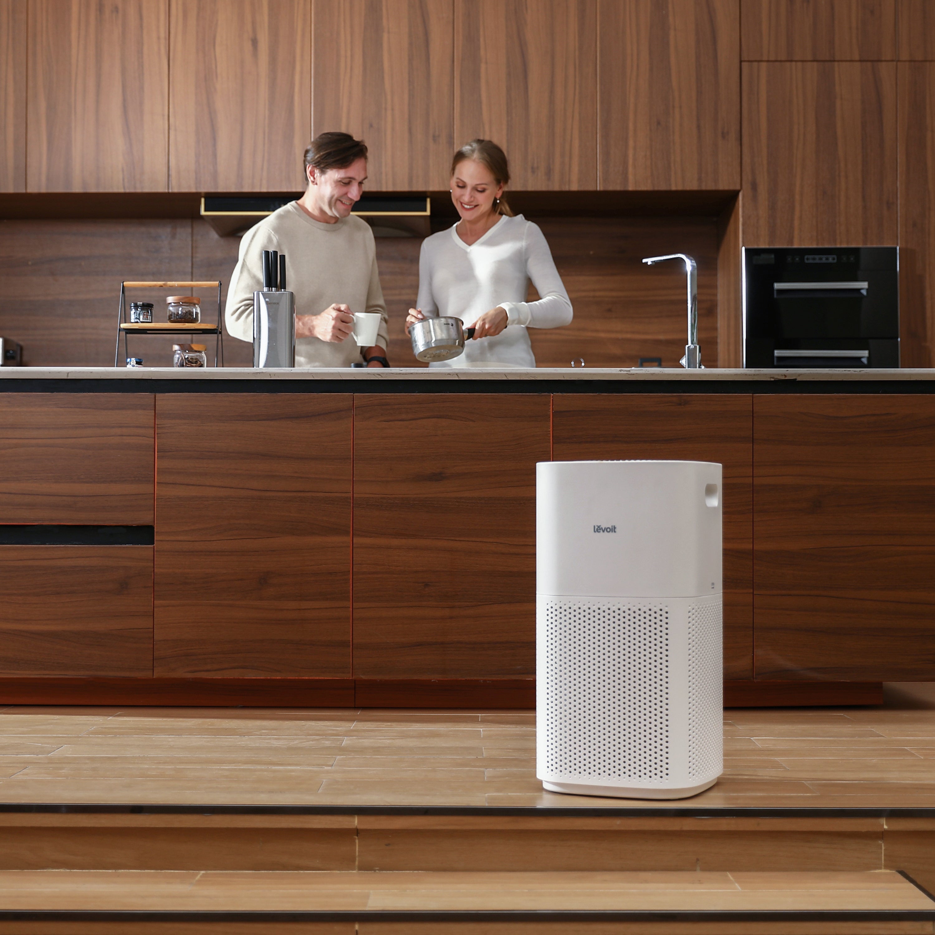 Levoit Core 600S Smart Air Purifier in kitchen, ensuring clean air while cooking, ideal for maintaining fresh air in home environments.