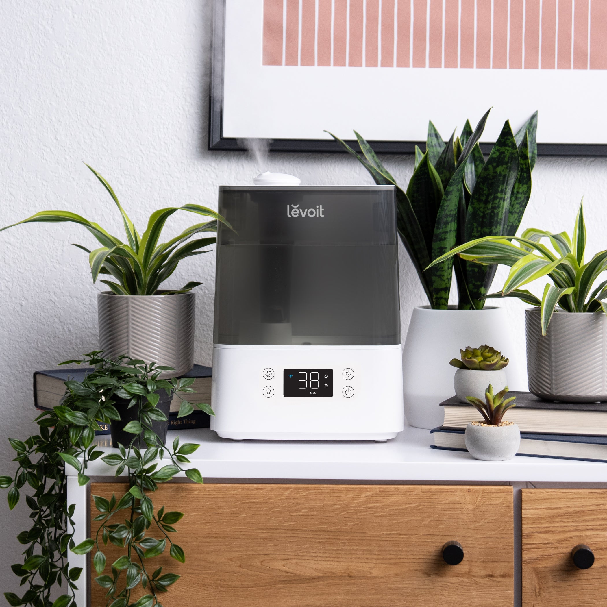 The Levoit Classic 300S Humidifier enhances room humidity, ideal for modern home settings